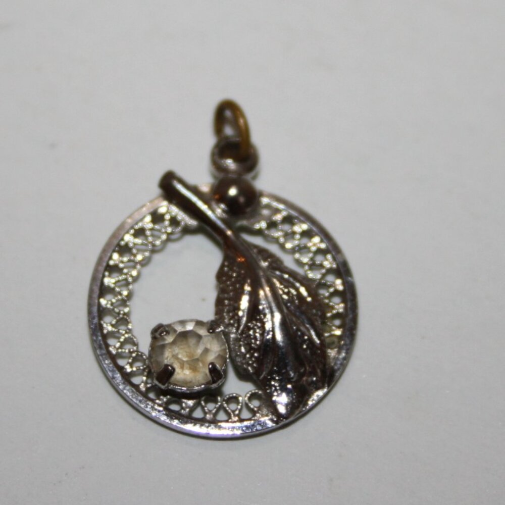 Beautiful vintage silver leaf and rhinestone pendant .75"